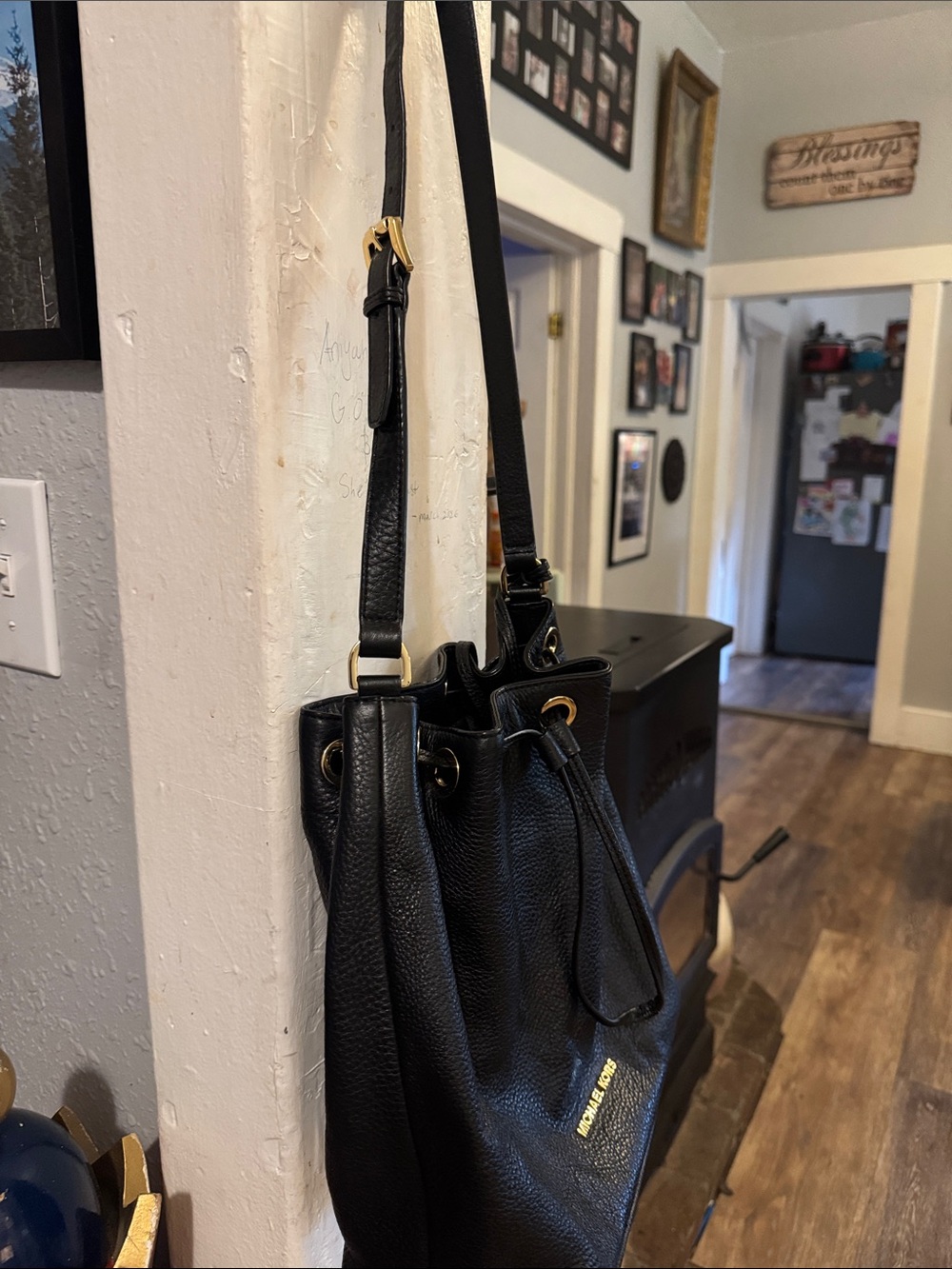 Michael Kors Black Pebbled Leather Drawstring Bucket Bag with Gold Hardware - Picture 4 of 5